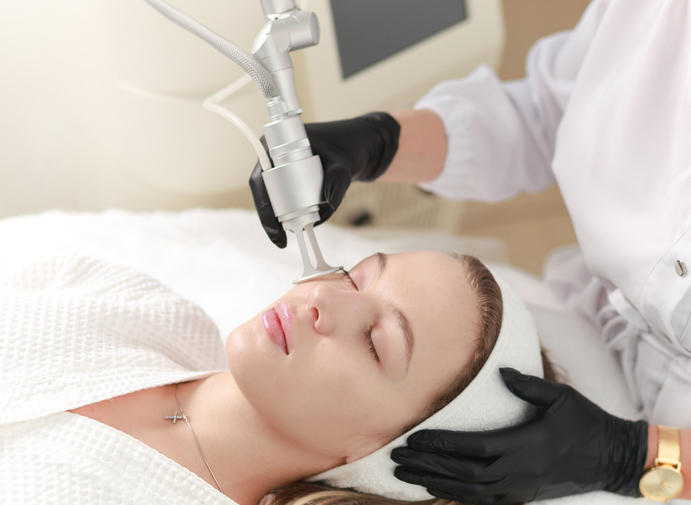 CO2 carbon dioxide laser resurfacing cosmetology procedure