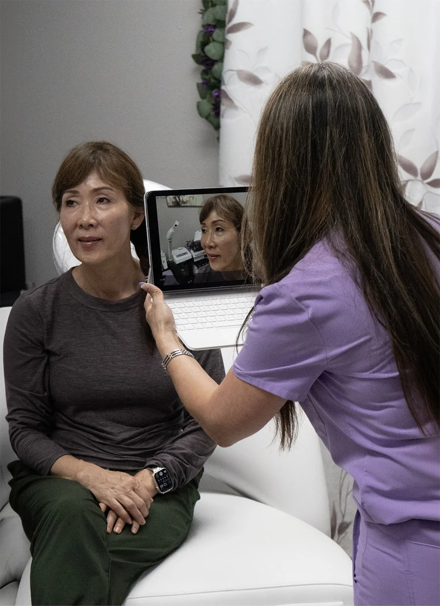 Healthcare provider examining patient in medical office during consultation - in Tampa, FL